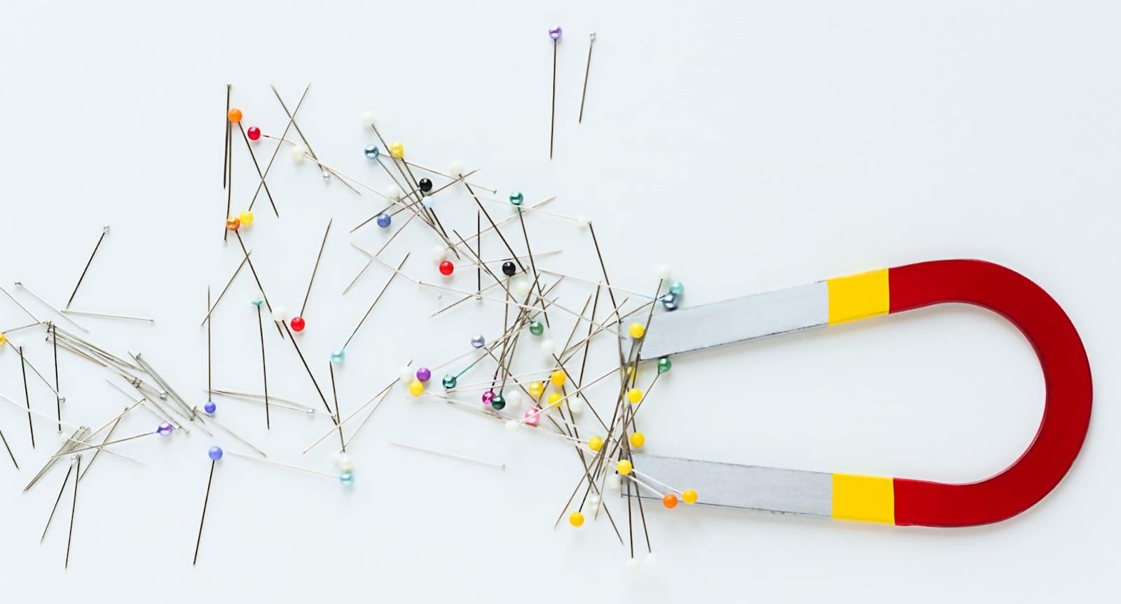 https://marshalldrygoods.com/wp-content/uploads/2024/09/overhead-shot-of-a-colorful-magnet-and-a-pile-of-p-2021-08-30-15-12-40-utc.jpg
