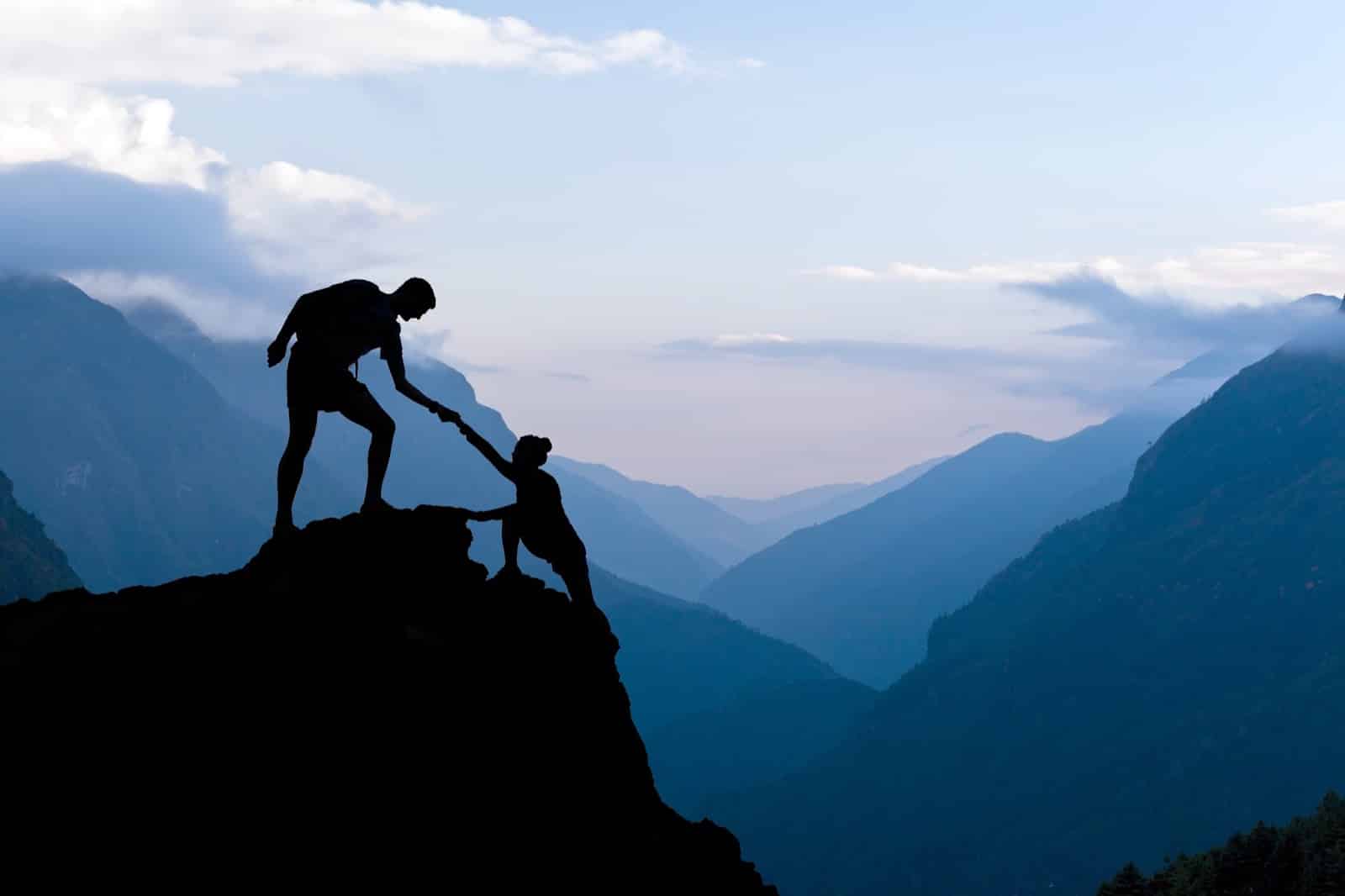 https://marshalldrygoods.com/wp-content/uploads/2024/09/teamwork-couple-climbing-helping-hand-2021-08-26-22-35-18-utc.jpg