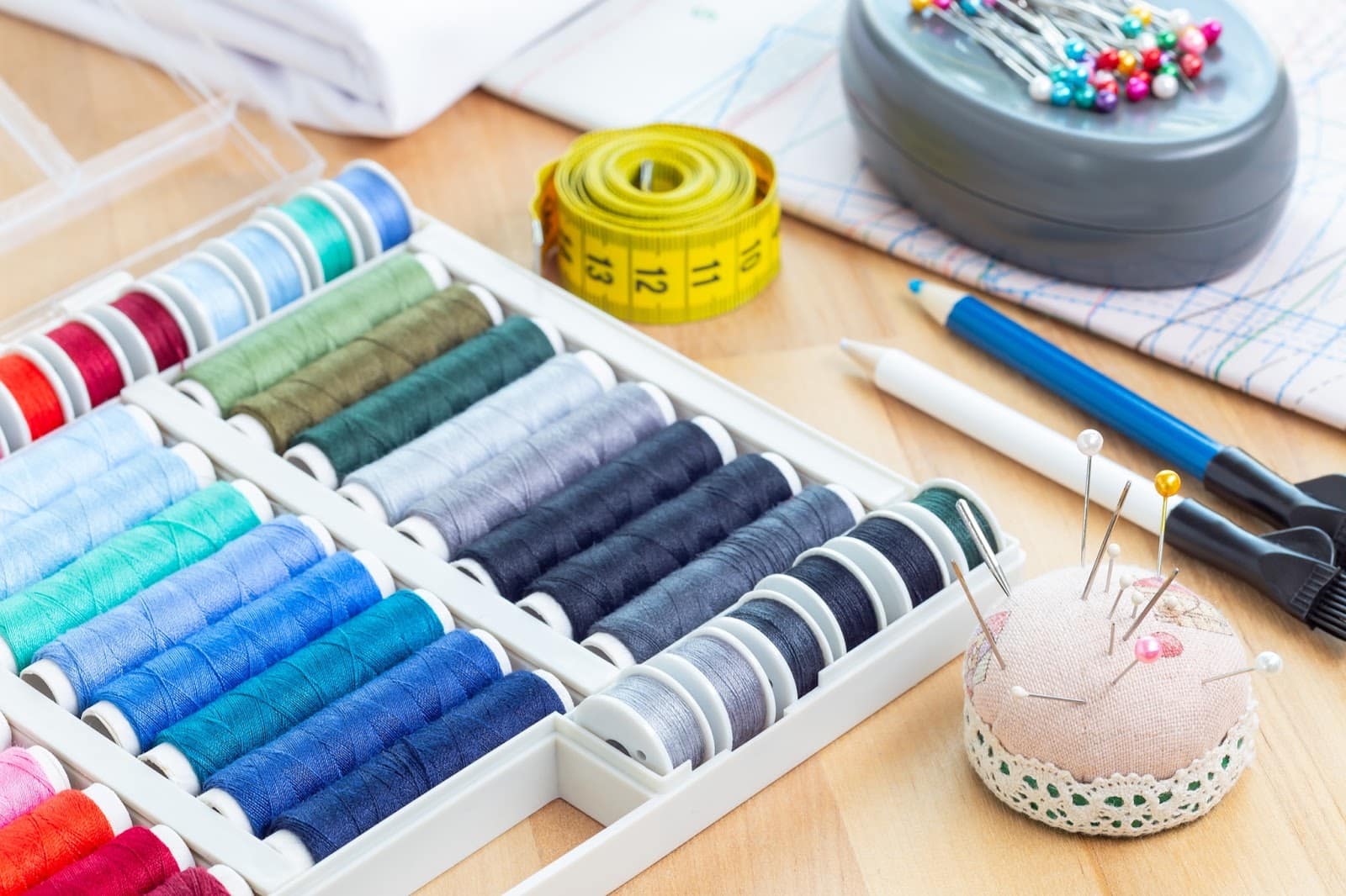 https://marshalldrygoods.com/wp-content/uploads/2024/09/various-sewing-accessories-spools-and-thread-sch-2021-09-03-22-57-40-utc.jpg