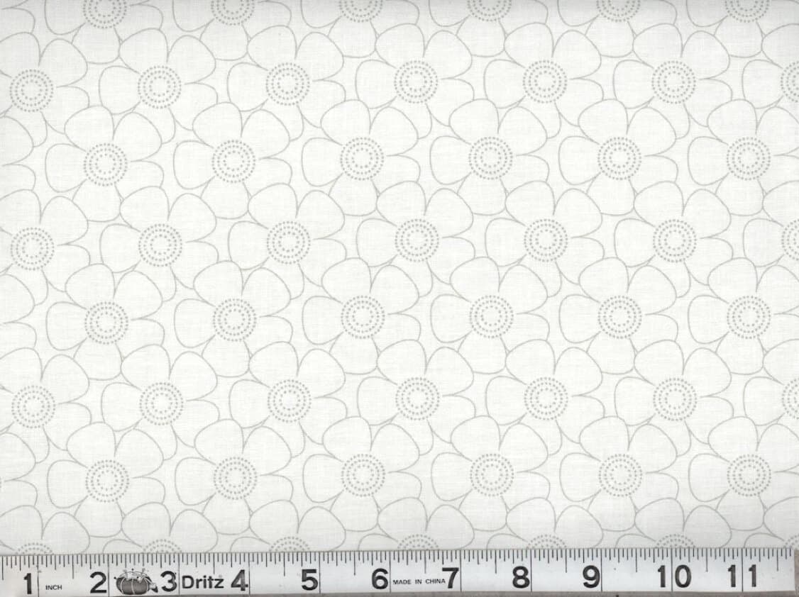 White quilting cotton with subtle grey outline daisies—scale shown in inches for sewing reference.