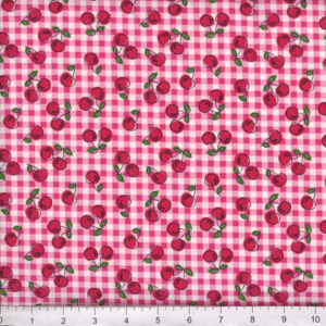 cherries on pink plaid fabric