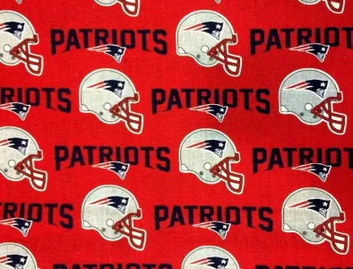 New England Patriots NFL licensed fabric with helmet and wordmark print on red.