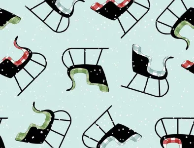 Riley Blake Christmas sled print fabric on light blue snow background.