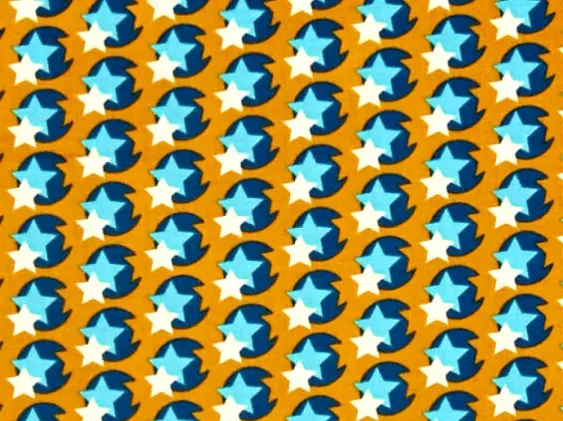 Orange and blue star print cotton fabric with geometric repeating pattern.